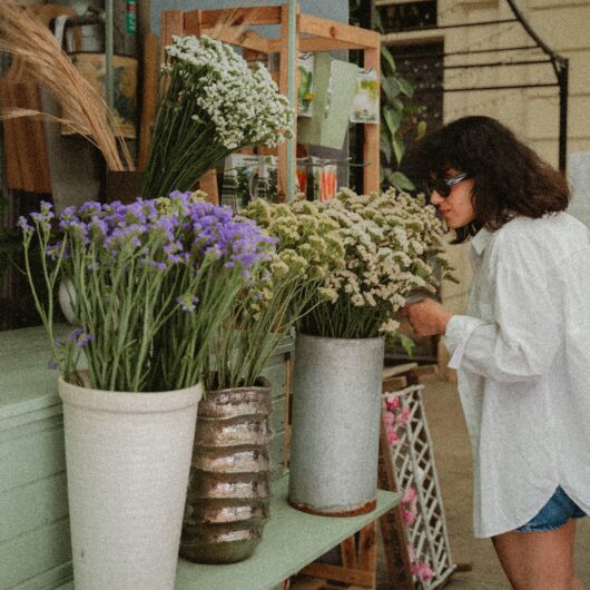 Woman shopping for flowers to break routine