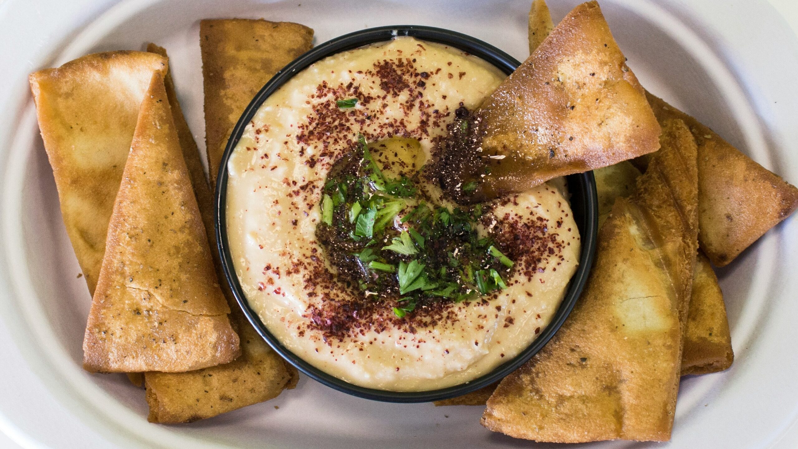 Hummus and pita chips lake snacks